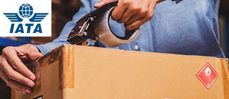 Packaging up dangerous goods with IATA logo.