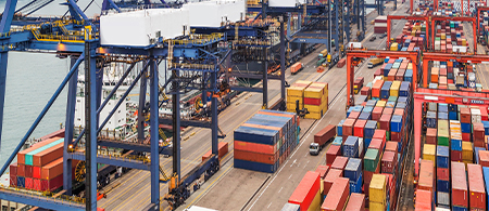 Automated stacking cranes in use at port.