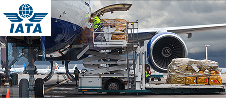 Air freighter being loaded with IATA logo.